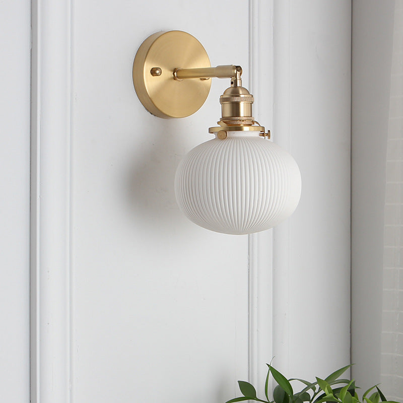 Vintage Brass Wall Light With Ceramic Detailing — Ashbury Home & Living