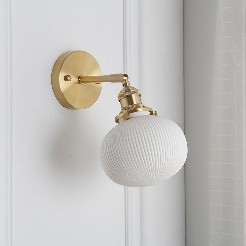 Vintage Brass Wall Light With Ceramic Detailing — Ashbury Home & Living