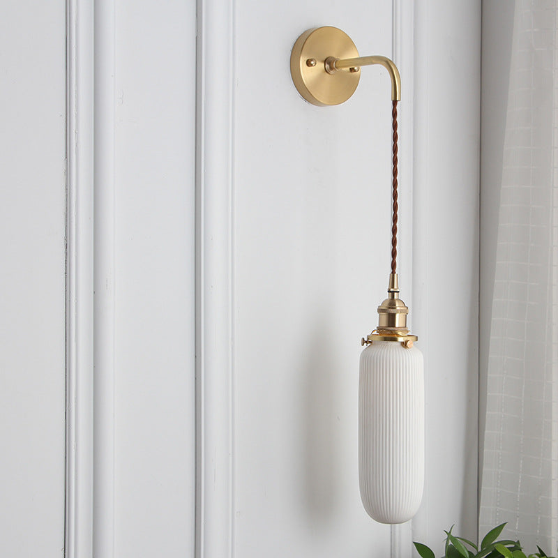 Vintage Brass Wall Light With Ceramic Detailing — Ashbury Home & Living