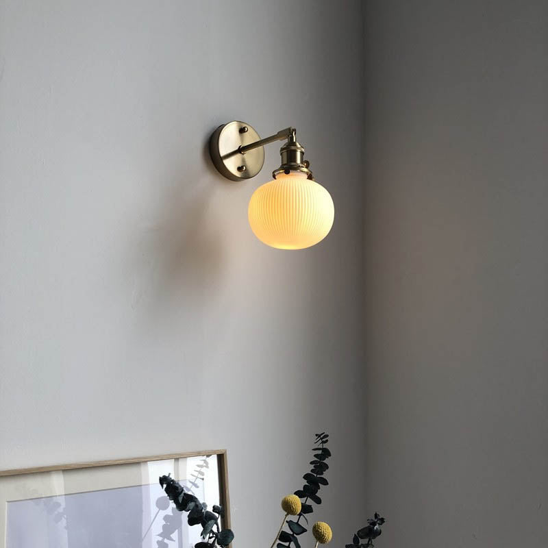 Vintage Brass Wall Light With Ceramic Detailing — Ashbury Home & Living