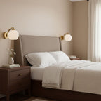 Contemporary Wrought Iron and Glass Wall Light With Warm LED Glow — Ashbury Home & Living