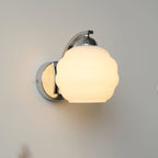 Contemporary Wrought Iron and Glass Wall Light With Warm LED Glow — Ashbury Home & Living