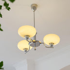 3-Light Opal Glass Globe Chandelier With Brass Frame