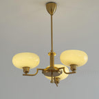 3-Light Opal Glass Globe Chandelier With Brass Frame