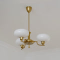 3-Light Opal Glass Globe Chandelier With Brass Frame