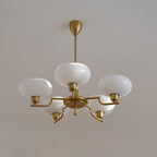 3-Light Opal Glass Globe Chandelier With Brass Frame