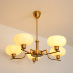 3-Light Opal Glass Globe Chandelier With Brass Frame