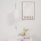 Ribbed Oval Wall Sconce With Pull Chain And Curved Arm