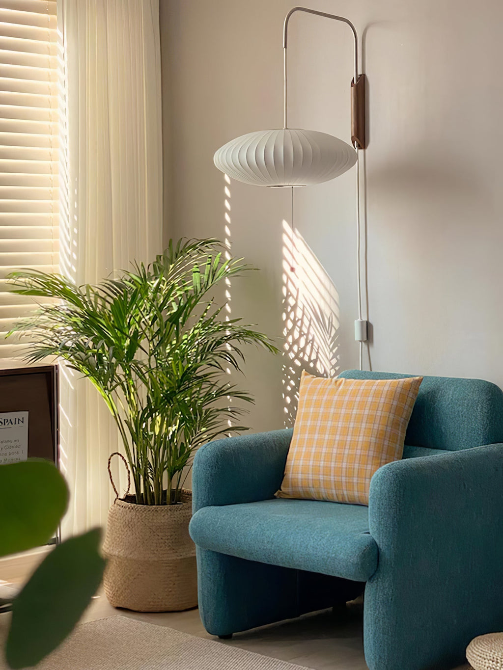 Ribbed Oval Wall Sconce With Pull Chain And Curved Arm