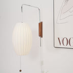 Ribbed Oval Wall Sconce With Pull Chain And Curved Arm