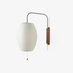Ribbed Oval Wall Sconce With Pull Chain And Curved Arm