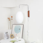 Ribbed Oval Wall Sconce With Pull Chain And Curved Arm