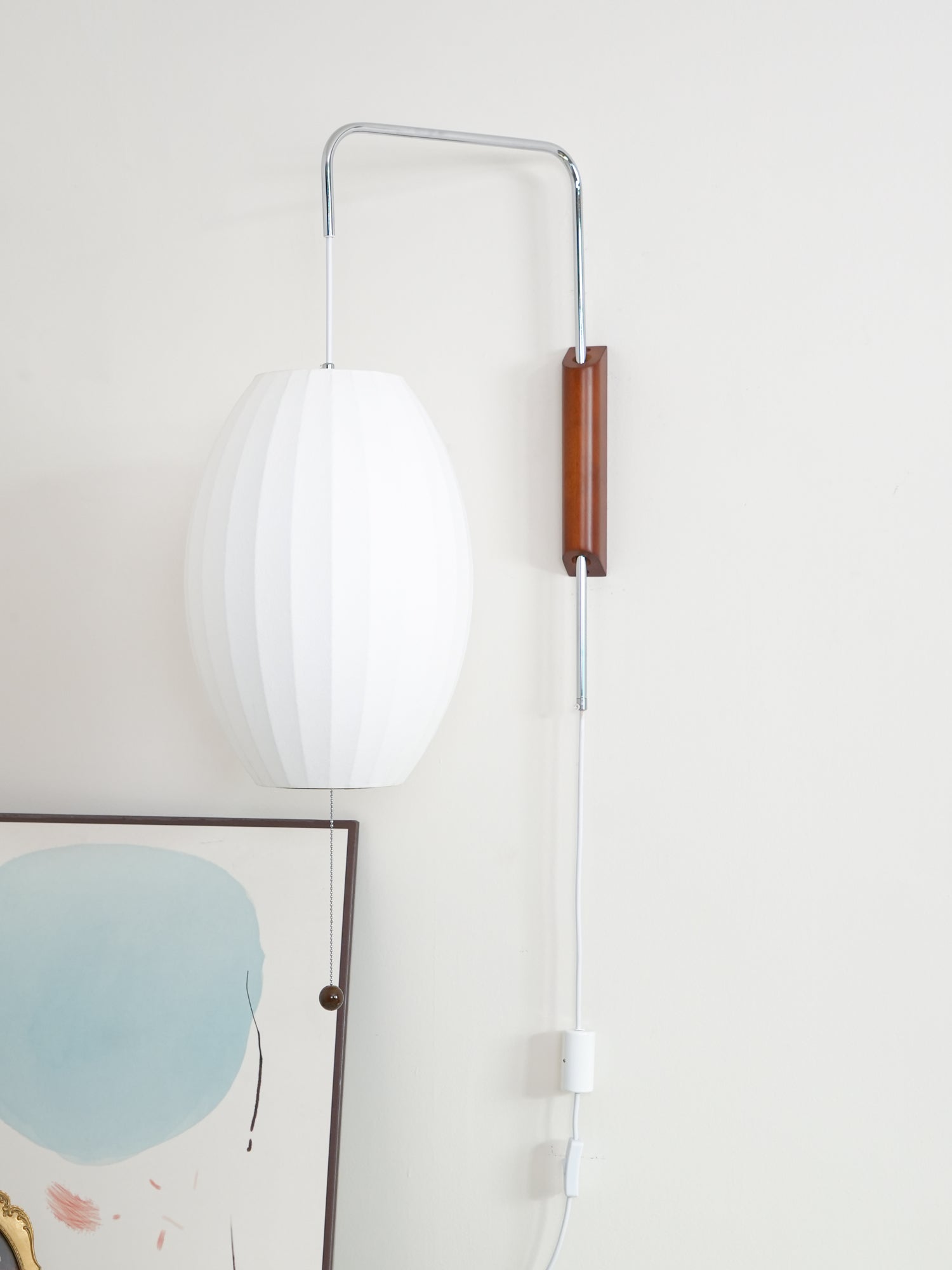 Ribbed Oval Wall Sconce With Pull Chain And Curved Arm