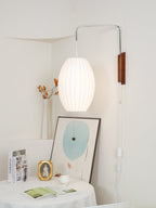 Ribbed Oval Wall Sconce With Pull Chain And Curved Arm