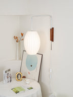 Ribbed Oval Wall Sconce With Pull Chain And Curved Arm