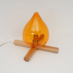 Flame-Inspired Glass Table Lamp With Wooden Cross Base