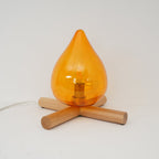 Flame-Inspired Glass Table Lamp With Wooden Cross Base
