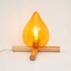 Flame-Inspired Glass Table Lamp With Wooden Cross Base