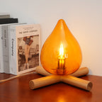 Flame-Inspired Glass Table Lamp With Wooden Cross Base