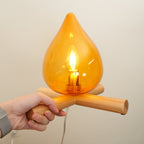 Flame-Inspired Glass Table Lamp With Wooden Cross Base