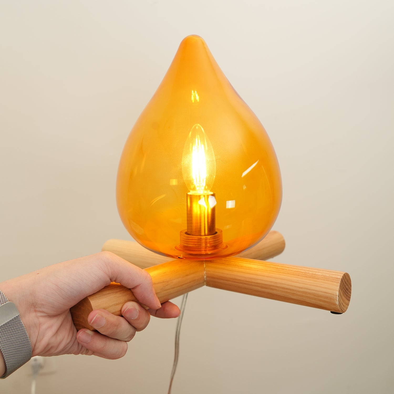 Flame-Inspired Glass Table Lamp With Wooden Cross Base