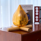 Flame-Inspired Glass Table Lamp With Wooden Cross Base