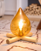 Flame-Inspired Glass Table Lamp With Wooden Cross Base