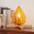 Flame-Inspired Glass Table Lamp With Wooden Cross Base