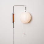 Ribbed Oval Wall Sconce With Pull Chain And Curved Arm