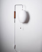 Ribbed Oval Wall Sconce With Pull Chain And Curved Arm