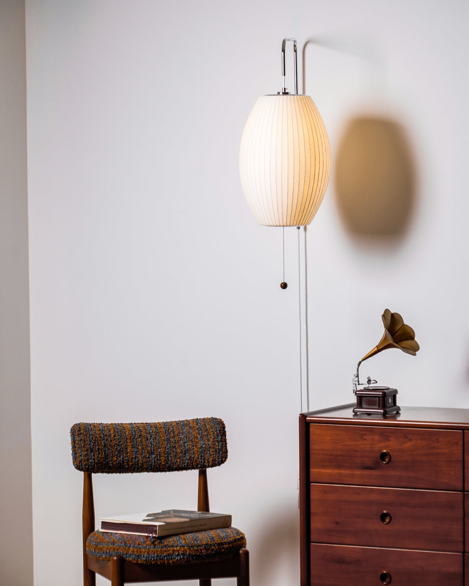Ribbed Oval Wall Sconce With Pull Chain And Curved Arm