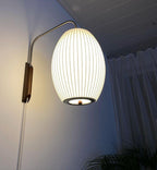 Ribbed Oval Wall Sconce With Pull Chain And Curved Arm