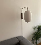 Ribbed Oval Wall Sconce With Pull Chain And Curved Arm