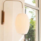 Ribbed Oval Wall Sconce With Pull Chain And Curved Arm