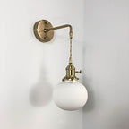 Vintage Brass Wall Light With Ceramic Detailing — Ashbury Home & Living