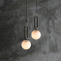 Natural Marble Globe Pendant Light with Black Loop Frame for Bedside Lighting