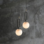 Natural Marble Globe Pendant Light with Black Loop Frame for Bedside Lighting