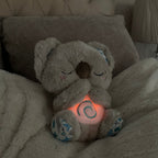 Breathing Koala Plush Sleep Soother Cuddly Toy with Rhythmic Breathing Motion | Soft Night Light and Soothing Sounds for Babies | Children and Adults